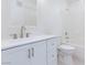 Modern bathroom featuring a white vanity, toilet and tub/shower combination at 5855 Valley Dr # 2018, North Las Vegas, NV 89031