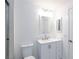 Bright bathroom featuring a toilet, vanity with sink, and glass shower at 5855 Valley Dr # 2018, North Las Vegas, NV 89031