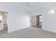 Bright bedroom with carpet, ceiling fan, and sliding glass doors to a private balcony at 5855 Valley Dr # 2018, North Las Vegas, NV 89031