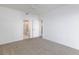 Clean and bright bedroom with carpet and ensuite bathroom at 5855 Valley Dr # 2018, North Las Vegas, NV 89031