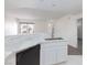 Open kitchen with modern faucet and black dishwasher at 5855 Valley Dr # 2018, North Las Vegas, NV 89031