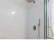 Bright shower with clear glass door, handheld shower, and rain style shower head at 5855 Valley Dr # 2018, North Las Vegas, NV 89031