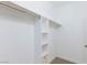 Walk-in closet with shelving and clothing rods at 5855 Valley Dr # 2018, North Las Vegas, NV 89031