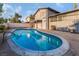 Backyard pool is inviting with clear water and a patio ideal for outdoor enjoyment at 608 Cragin Park Dr, Las Vegas, NV 89107