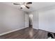 Bedroom with gray walls, wood-look flooring, and a closet is a cozy retreat at 608 Cragin Park Dr, Las Vegas, NV 89107