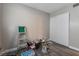 Empty bedroom featuring gray walls, laminate flooring, and closet at 608 Cragin Park Dr, Las Vegas, NV 89107
