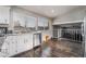 Well-lit kitchen with stainless steel appliances and light granite countertops at 608 Cragin Park Dr, Las Vegas, NV 89107