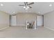 Large bonus room with carpeted flooring and a staircase leading down at 6278 Heather Creek Pl, Las Vegas, NV 89122