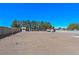 Vast backyard showcasing potential for customization and expansion with a detached shed and space to expand at 736 N Kiel St, Henderson, NV 89015
