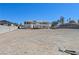 Large backyard with the home's exterior in the background, plus room for parking at 736 N Kiel St, Henderson, NV 89015