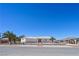 Charming single-story home featuring a gated entry, desert landscaping and a spacious two car garage at 736 N Kiel St, Henderson, NV 89015