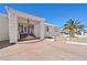Charming front entrance showcasing a landscaped yard with a covered entryway and plenty of natural light at 736 N Kiel St, Henderson, NV 89015