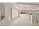 Bright kitchen with tile floor, tile backsplash, granite counters, and modern appliances at 736 N Kiel St, Henderson, NV 89015