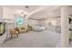 Spacious main bedroom featuring a fireplace, sitting area, and a large arched window at 736 N Kiel St, Henderson, NV 89015