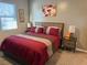 Cozy bedroom featuring a comfortable bed, soft lighting, and tasteful decor at 742 Agave Falls St, Henderson, NV 89011