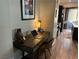 A cozy, modern office space next to the kitchen features natural light and plenty of work space at 742 Agave Falls St, Henderson, NV 89011