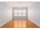 Bright bedroom featuring hardwood floors, recessed lighting, and an ample natural light at 7808 Foothill Ash Ave, Las Vegas, NV 89117