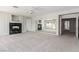 Large living area showcasing a fireplace and ample natural light at 7808 Foothill Ash Ave, Las Vegas, NV 89117