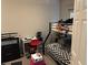 Bedroom with bunk beds, desk, and storage at 8113 Mineola Palms St, Las Vegas, NV 89139
