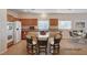 Well-equipped kitchen featuring stainless steel appliances, a breakfast bar, and a dining area at 85 Alerion St, Las Vegas, NV 89138