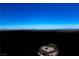 Aerial view of a home in the desert with mountains in the background at 9643 Ponderosa Skye Ct, Las Vegas, NV 89166