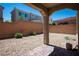 Cozy backyard with pavers and a retaining wall at 9643 Ponderosa Skye Ct, Las Vegas, NV 89166