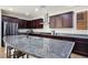 Spacious kitchen featuring stainless steel appliances, a large island, and ample counter space at 9643 Ponderosa Skye Ct, Las Vegas, NV 89166