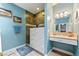 Stylish bathroom featuring a tiled shower with a built-in niche and vanity at 1000 E Enchanted Mesa St, Pahrump, NV 89048