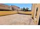 Low-maintenance backyard with dirt landscaping at 10716 Shasta Glow Ct, Henderson, NV 89052