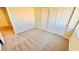 Bedroom with closet, carpet, and a window view at 10716 Shasta Glow Ct, Henderson, NV 89052