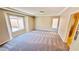 Bedroom featuring carpet and natural light at 10716 Shasta Glow Ct, Henderson, NV 89052