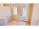 Bright entryway featuring tiled floors, a decorative glass door, and a sidelight window for natural light at 10716 Shasta Glow Ct, Henderson, NV 89052