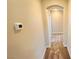 Hallway with carpet and a doorway leading to another room at 10716 Shasta Glow Ct, Henderson, NV 89052