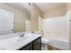 Bathroom includes vanity with sink and tiled shower-tub combo at 11094 Arcadia Sunrise Dr, Henderson, NV 89052