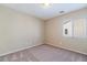 A bedroom features carpet, paint, and a window at 11094 Arcadia Sunrise Dr, Henderson, NV 89052