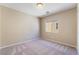 A bedroom features neutral carpet, paint, and a window at 11094 Arcadia Sunrise Dr, Henderson, NV 89052