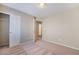 A bedroom has carpet and a closet with doors at 11094 Arcadia Sunrise Dr, Henderson, NV 89052