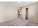 A bedroom has carpet, a window, and a closet with doors at 11094 Arcadia Sunrise Dr, Henderson, NV 89052