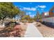 Beautifully landscaped community park with walking paths, lush greenery, and inviting spaces at 11094 Arcadia Sunrise Dr, Henderson, NV 89052