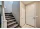 Entryway with tiled floor, staircase, and doors to other rooms at 1111 Frye Mesa Ave, North Las Vegas, NV 89086