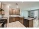 Well-lit kitchen with granite countertops, modern cabinets, and ample counter space at 1111 Frye Mesa Ave, North Las Vegas, NV 89086