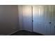 Bedroom with a closet featuring bi-fold doors and neutral wall paint at 1147 Light Sky Ave, Henderson, NV 89074