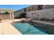 Inviting pool and spa with decorative tile and surrounding patio, perfect for relaxation and outdoor enjoyment at 1147 Light Sky Ave, Henderson, NV 89074