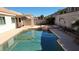 Backyard swimming pool with a pergola and tiled jacuzzi at 1147 Light Sky Ave, Henderson, NV 89074