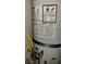 Close-up of an automatic storage water heater with all of its labels at 1147 Light Sky Ave, Henderson, NV 89074