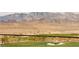 Incredible backyard view with a pristine golf course and majestic mountains as the backdrop at 11660 Summit Club Dr # 204, Las Vegas, NV 89135