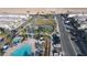 Aerial shot of neighborhood amenities including a pool, park, and playground at 12237 Plum Mist Ct # 4, Las Vegas, NV 89183