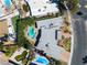 Aerial view of a property with desert landscaping, a unique shaped pool, and patio at 1409 Bonita Ave, Las Vegas, NV 89104