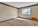 Empty bedroom with a large window allowing lots of natural light to brighten the space at 1409 Bonita Ave, Las Vegas, NV 89104