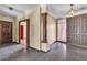 Foyer with marble pillar, granite floors, and entry doors that lead to other parts of the house at 1409 Bonita Ave, Las Vegas, NV 89104